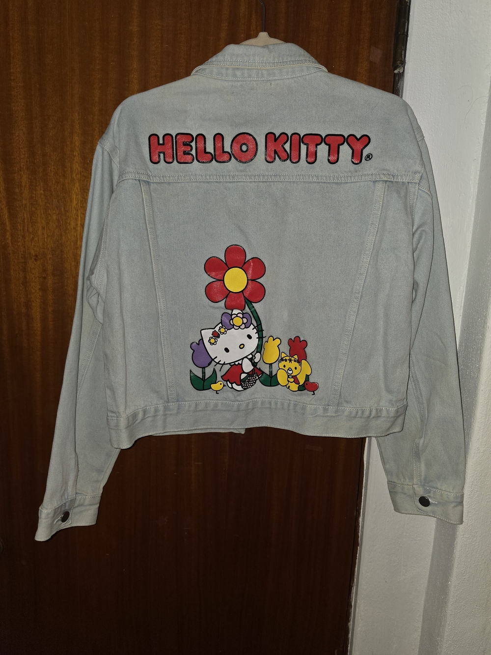 Hello Kitty Light Blue Denim Jacket with Colorful Flower Graphic